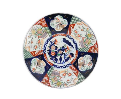 A 19th Century fine quality Imari circular Platter, decorated in the typical taste with flowers, birds, etc., approx. 40cms d