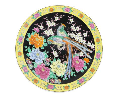 An attractive 20th Century Japanese circular Platter, the center black ground with decorative colourful design of birds and f
