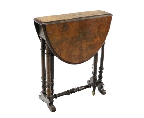 A Victorian walnut Yacht Table, of small proportions with demi-lune laps, with gate leg action and turned pillar supports, 53