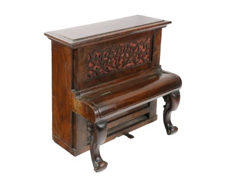 A Victorian "Apprentice" upright mahogany cased Piano, the moulded top over pierced front on front scroll legs, and lift top 