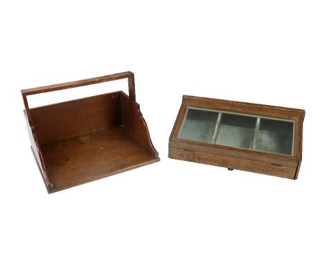 An oak cased Table Curio Cabinet,&nbsp;with hinge top, glazed front, together with an oak Book Trough with carrying handle an
