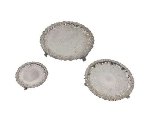 A very good heavy Victorian silver plated set of 3 graduating circular Trays, etched bodies, embossed borders, on paw type fe