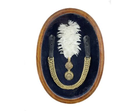 Militaria: [Royal Fusiliers] A cased Display,&nbsp;with central Officers fur cap Grenade,&nbsp; (c. 1901-14), with plume inse