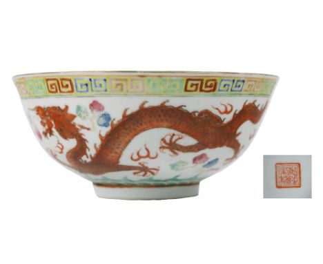 An attractive and colourful 19th Century Chinese Bowl, with Qianlong type red square mark on base, the interior with central 