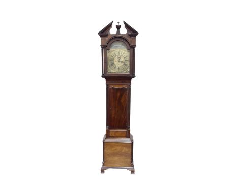 A fine quality mahogany cased Grandfather Clock, the pediment with central urn above an arched glazed door housing a painted 