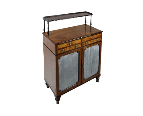 A fine quality Regency mahogany and ebonised Chiffonier, in the manner of Ince and Mayhew, the shelf back supported by turned