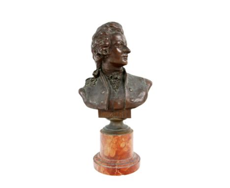 A 19th Century bronze head and shoulder Bust of Mozart, on a rouge marble pillar base, approx. 23cms (9") high. (1)