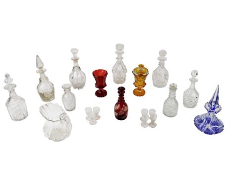 A collection of varied 19th Century / 20th Century cutglass and moulded Decanters and stoppers; together with some etched col