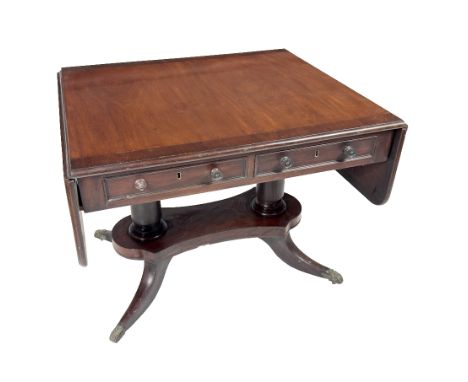 A fine quality 19th Century mahogany Sofa Table, the top with wide rosewood crossbanding and demi-lune flaps, above two friez