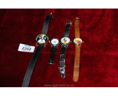 Four children watches including a Timex Winnie the Pooh, Lorus Mickey Mouse etc.