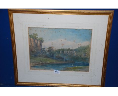 A framed and mounted watercolour of a river meandering through a stone clad valley, signed lower left G R Gill (foxing damage