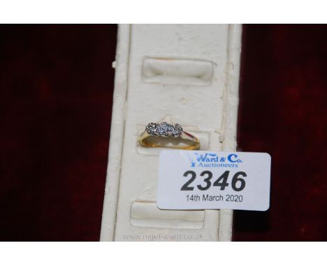 An 18ct gold and platinum and diamond Ring; size R, hallmarked.