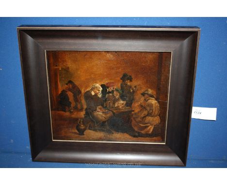 An Oil laid down on panel of topers playing cards in a tavern, in the manner of David Tenners. 12" x 15".