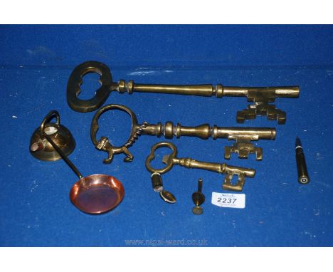 A quantity of brass including circular Plate with Egyptian design, fireguard, keys and miniature ornaments