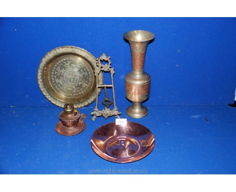 A Rhodesian copper Dish based on an aircraft wheel hub C.A.A. circa 1946, brass picture stand, brass vase, brass candle light