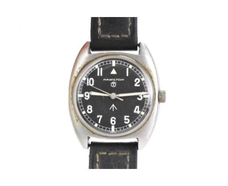 A Hamilton, military issue, manual wind, gents, stainless steel wristwatch, circa 1975, the black dial having luminous hands 