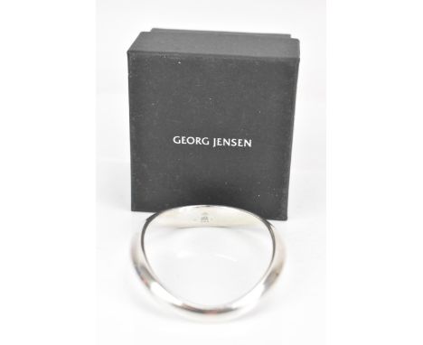 A Georg Jensen silver 'curve' bangle No. 501, designed by Regitze Overgaard, with box, 48 gramsIf there is no condition repor