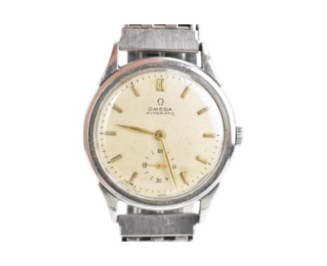 An Omega, automatic, gents, stainless steel wristwatch, circa 1940s, the dial having gilt baton markers, subsidiary seconds d