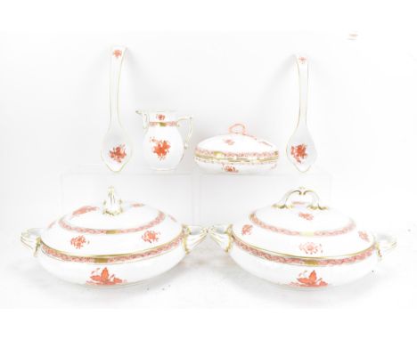 A collection of Herend Hungarian porcelain dinnerware, each in the rust coloured Chinese Bouquet pattern, to include two ture