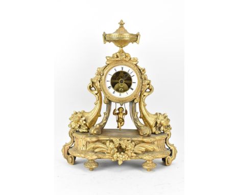 A late 19th century French gilt metal mantle clock, the case decorated with an urn finial, flowers and two cornucopias flanki