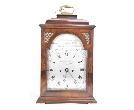 A mid 18th century mahogany bracket clock by Conyers Dunlop, London. The case having a bell top with brass handle, stepped co