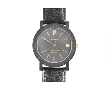 A Bulgari New York, automatic, ladies, black coated stainless steel wristwatch, the black dial with gilt baton markers, date 