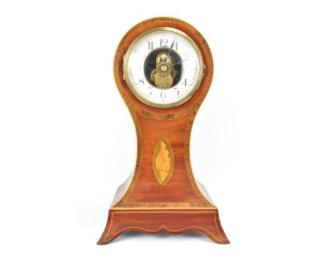 An early 20th century Eureka electric mahogany cased mantle clock, the enamel dial having Arabic numerals and blued hands, th