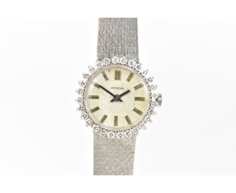 An Antheor, manual wind, ladies 18ct white gold diamond set cocktail watch, the dial having baton markers, the bezel inset wi