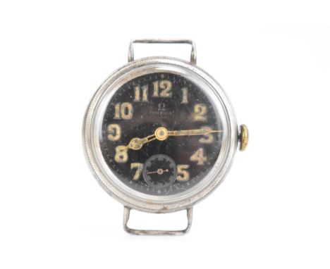 An Omega World War (WWI) manual wind, gents wristwatch, the black dial having Arabic numerals with a subsidiary seconds dial 
