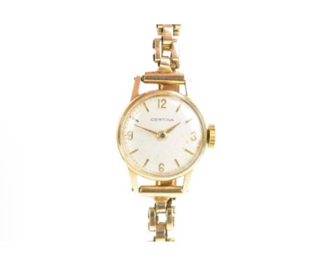 A Certina, manual wind, ladies, 9ct gold wristwatch, having a silvered dial with baton markers and Arabic numerals, on a 9ct 