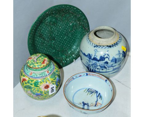 A CHINESE FAMILLE VERT YELLOW GROUND GINGER JAR AND COVER, painted with Buddhist lions and lotus, a blue and white ginger jar