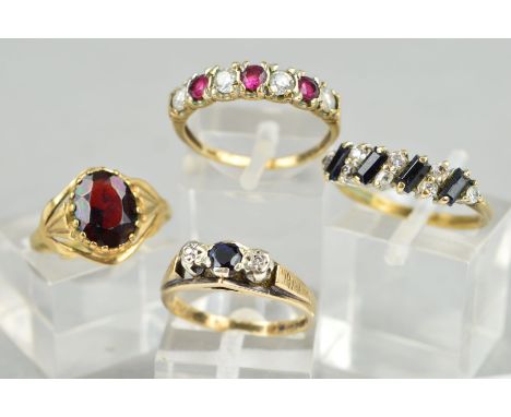 FOUR 9CT GOLD GEM RINGS, to include a sapphire and diamond three stone ring, ring size J1/2, a sapphire and colourless paste 