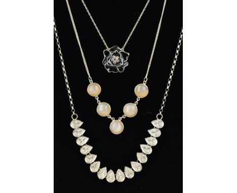 THREE NECKLACES, the first designed as a circular chalcedony cabochons to the fine belcher link chain, the second a black ena