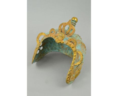 A 20TH CENTURY CAST METAL CHINESE DECORATIVE HELMET, gilt and verdigris finish, height 25cm (under end cabinet in hallway)