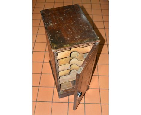 A GEORGE V J.L.GREEN AND CO 1913 PAINTED OAK OFFICE CABINET, the single door enclosing a series of filing shelves and divided