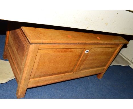 A LIGHT OAK PANELLED BLANKET CHEST
