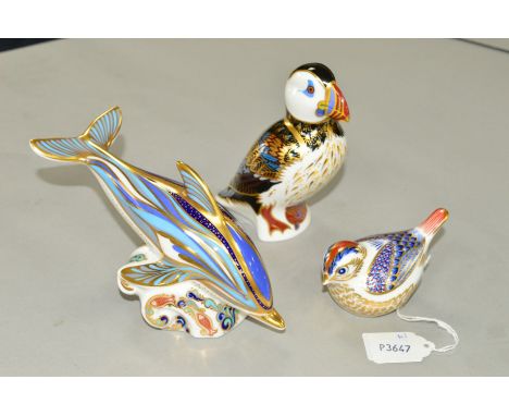 THREE ROYAL CROWN DERBY PAPERWEIGHTS, 'Goldcrest' gold button and two silver button seconds 'Dolphin' and 'Puffin' (3)