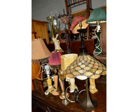 THIRTEEN VARIOUS TABLE LAMPS to include two figural lamps, Tiffany style lamp, a walnut mantle clock and a brass snooker ceil