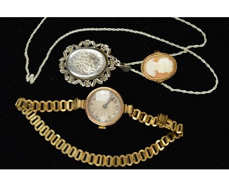 A MISCELLANEOUS COLLECTION OF JEWELLERY to include an early 20th Century gold lady's wrist watch, a round dial, case measurin