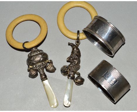 A GEORGE V MR PUNCH BABY'S RATTLE, mother of pearl handle, ivorine teether, (sd), makers Crisford & Norris, Birmingham 1931, 