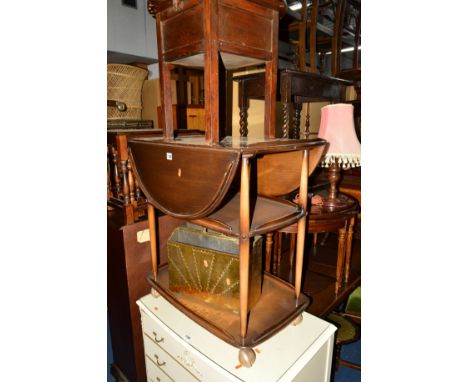 AN ERCOL DROP LEAF TEA TROLLEY, a set of four ercol chairs (situated by lot 1215) a circular coffee/nest of five tables, an o