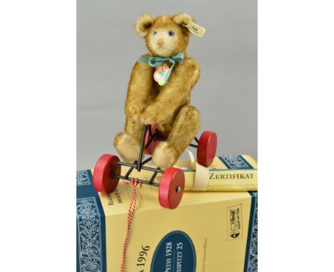A BOXED LIMITED EDITION STEIFF 'RECORD PETSY 1928' BEAR, No 407468, O1072/4000, sitting in pull-along cart that is fitted wit