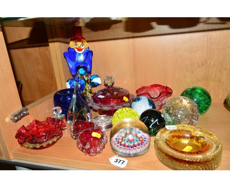 VARIOUS GLASSWARES, to include ruby glass dishes, Millefiori paperweight, glass clown, a Adam Jablonski paperweight etc