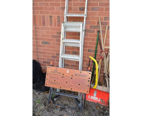 A BLACK AND DECKER WORKMATE and two pairs of aluminium step ladders