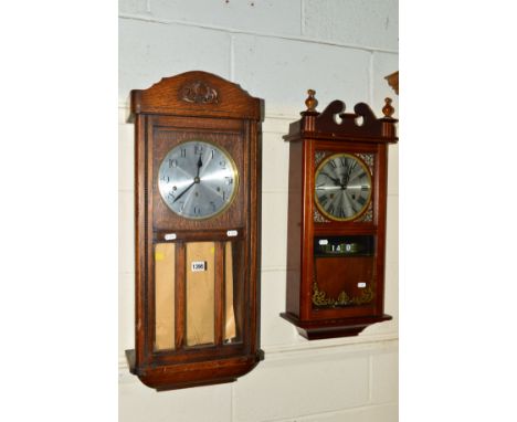 A 20TH CENTURY OAK WALL CLOCK and a modern wall clock (two keys and two pendulums) (2)