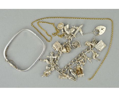 THREE ITEMS OF JEWELLERY, to include a charm bracelet, the curb link bracelet suspending eighteen charms including a carousel
