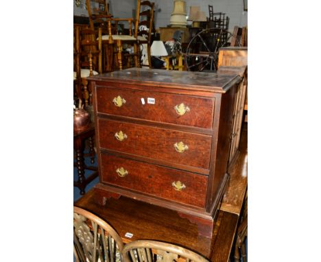 A GEORGIAN AND LATER MAHOGANY CHEST of three long graduating drawers on bracket feet, approximate size width 61.5cm x depth 4