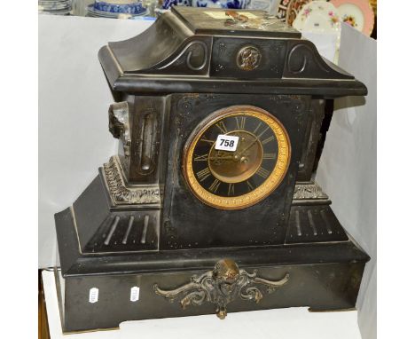 A LATE VICTORIAN BLACK SLATE MANTEL CLOCK OF ARCHITECTURAL FORM, black and gilt dial with Roman numerals, (key and  pendulum)
