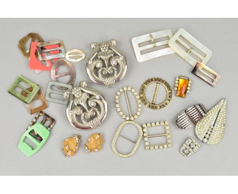 A SELECTION OF BUCKLES, to include a pair of mother of pearl buckles, plastic buckles, one designed as a bow, paste buckles, 