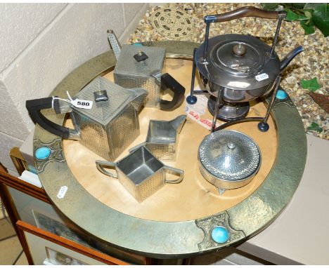 A SQUARE SHAPED FOUR PIECE PEWTER TEA SERVICE, a Deco style mirror frame (no mirror) and a plated teapot/stand